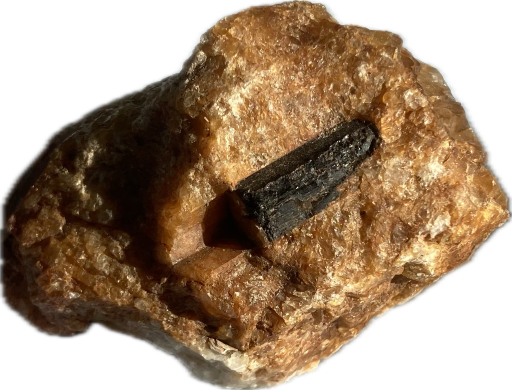 Maybe black tourmaline and orange quartz rock