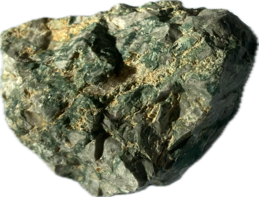 Green, grey,and brown chunky rock
